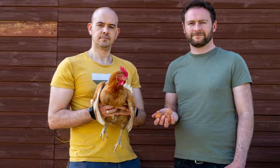 Jack (right), Chris and Alison the hen outside the chicken shed.