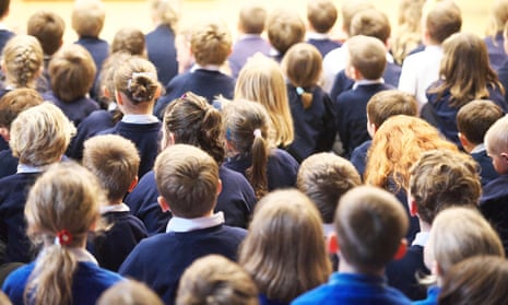 rows of schoolchildren seen from behind