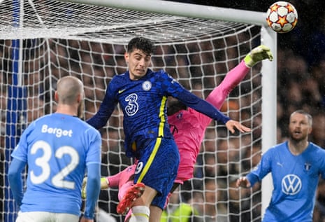 Malmo’s flapping keeper Ismael Diawara is bundled over by Chelsea’s Kai Havertz.