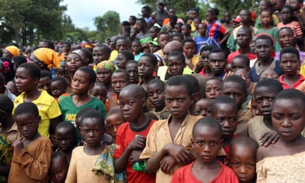 Burundian refugees listen to Tanzanian PM Kassim Majaliwa speak at Nduta camp in Kigoma, Tanzania.