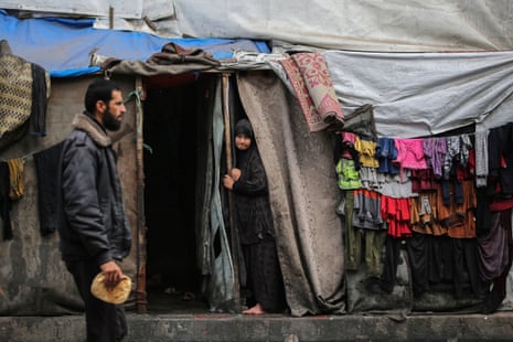 People continue to shelter in makeshift tent camps in Rafah, 30 April.