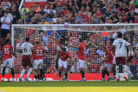 Manchester United keeper Altay Bayindir can only part-punch the ball under a challenge from William Saliba and it leads to Arsenal’s winning goal at Old Trafford in August.