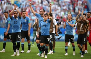 Uruguayâs players celebrate after the win over Russia
