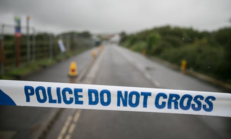 Police tape on a rural road in Northern Ireland