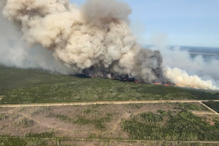 A wildfire burns near Wanless in Manitoba, Canada on 27 May.