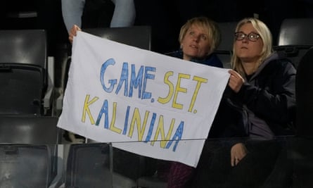 Spectators hold a banner showing their support for Kalinina at the Italian Open