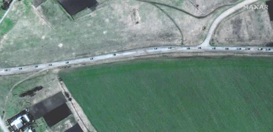 This handout satellite image released by Maxar Technologies shows the northern end of a large military convoy consisting of hundreds of vehicles moving south through the Ukrainian town of Velykyi Burluk.