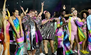 Erik Yvon (centre) dances with models after the Erik-Yvon show during Australian fashion week in Sydney