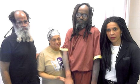 Mumia Abu-Jamal, third from the left, in a picture taken last April after his medical emergency with his brother Keith Cooke, and supporters Pam Africa and Johanna Fernández.