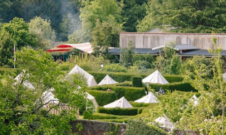 Is it a campsite? Is it a festival? This Welsh 'summer camp' feels like the best of both | Camping holiday 2 The layout of the camp encourages people to socialise.