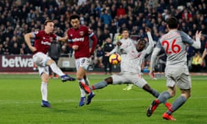 Mark Noble sends a first-time shot inches over the bar.