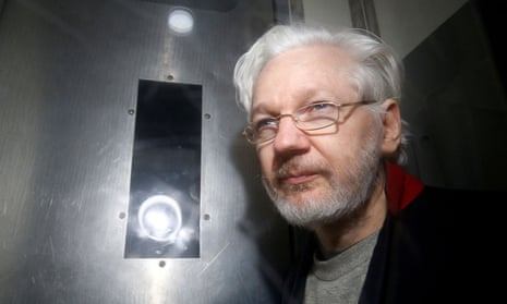 WikiLeaks co-founder Julian Assange is taken in custody from a London court last year.