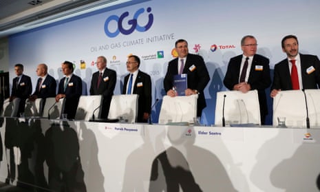 Oil and gas industry leaders arrive to attend a news conference during the Oil and Gas Climate Initiative summit in Paris