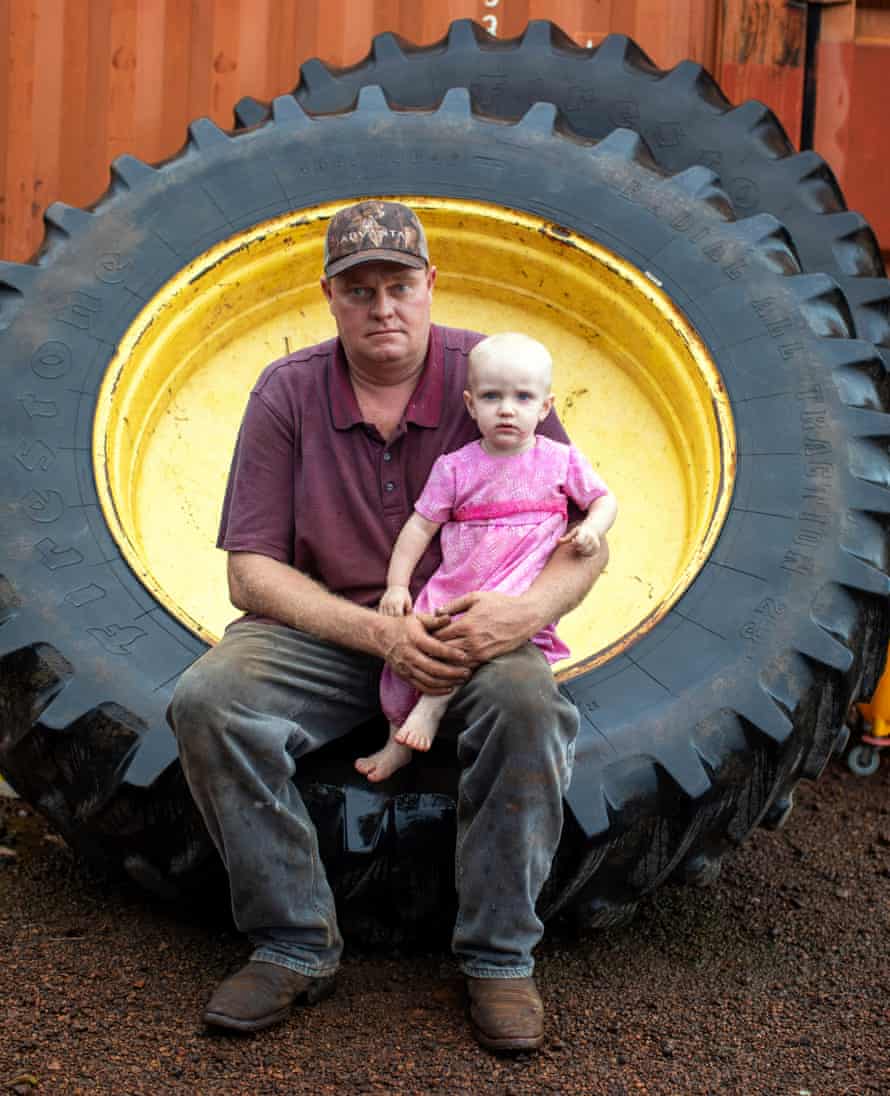 Rice farmer Abram Loewen and his daughter Ana.