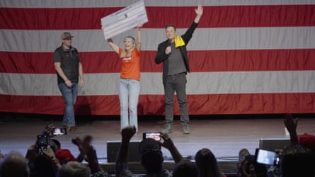Elon Musk presents a $1m cheque to a signatory of his ‘free speech’ petition