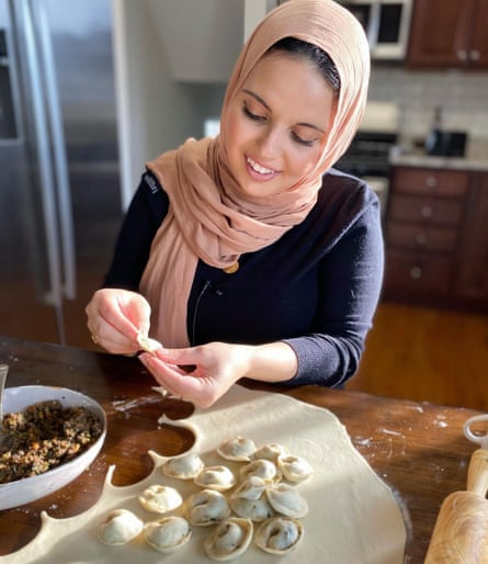 Heifa Odeh making shish barak in her kitchen.