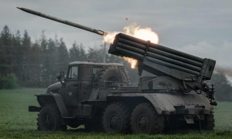 A rocket is launched from a truck-mounted multiple rocket launcher near Svyatohirsk, eastern Ukraine.