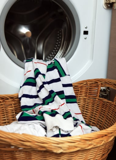 Hang the clean laundry out of the washing machine in a basket