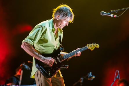 Stephen Malkmus playing the guitar on stage