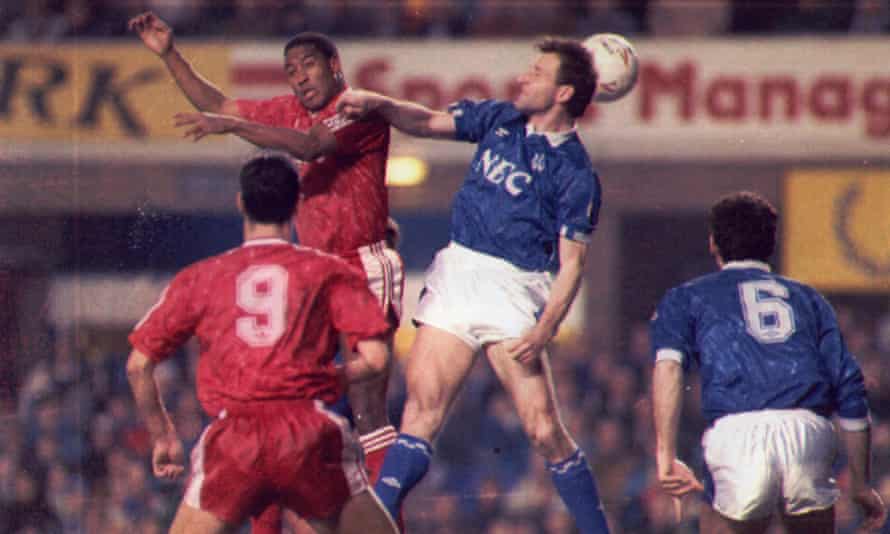 John Barnes and Dave Watson contest an aerial duel in the historic 4-4 FA Cup draw in 1991