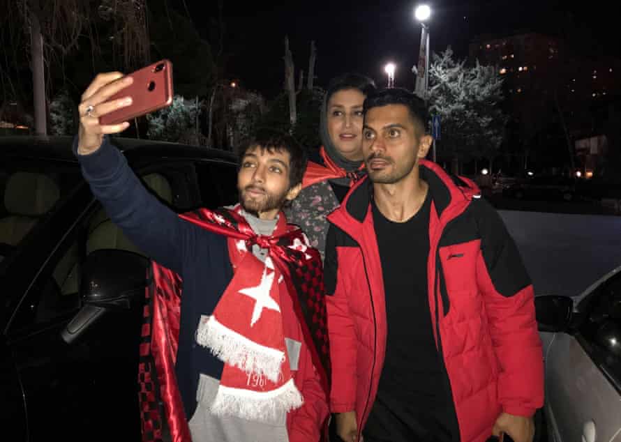 Zeinab takes a selfie with a Perspolis football player in a hotel in Tehran. She had gone to the stadium disguised as a man.