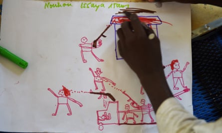 A child draws images depicting Boko Haram attacks, from a refugee camp in Chad.