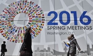 A banner announces the 2016 spring meetings of the IMF and World Bank