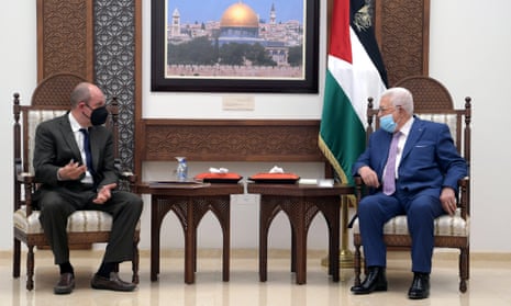 Hady Amr (left) with the Palestinian Authority president, Mahmoud Abbas, in Ramallah in May 2021