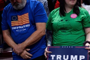 A fan wears a T-shirt with the so-called Betsy Ross flag, a 13-star Revolutionary War symbol which has been co-opted by far-right groups