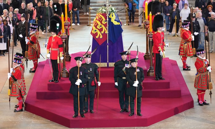 Alister Jack (front left) and Ben Wallace (front right) guard the Queen’s coffin.