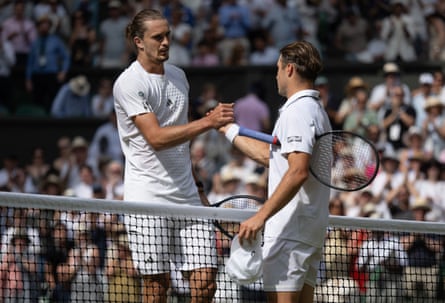 Alexander Zverev shakes hands with Arthur Fery after the match.