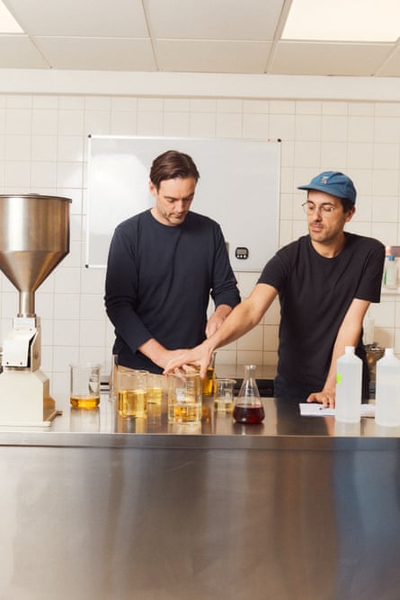 two men in a perfume workshop