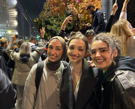 Sara, 24, centre, celebrates the opposition election win in Belgrade, Serbia, flanked by her friends.
