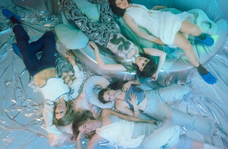 Aoife McGuinness, Jessie Dymond Barber and the team laying on the floor at Overflow in Berlin.