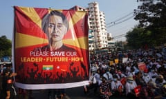 Protesters demonstrate against the military coup in front of a National League for Democracy (NLD) office in Myanmar in 2021.