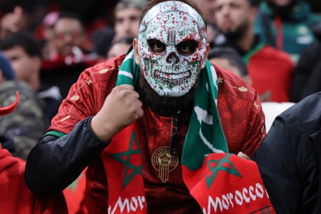 A Morocco fan with a skull mask.