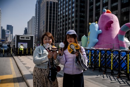 BTS fans pose for a picture