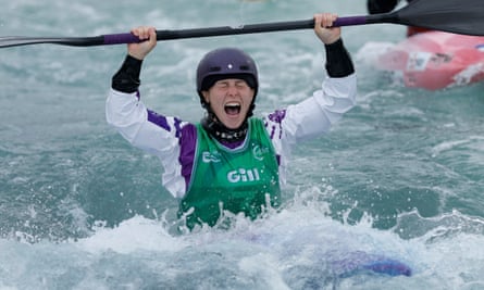 Kimberley Woods celebrates after victory in the women’s kayak cross final at the Canoe Slalom World Championships in 2023