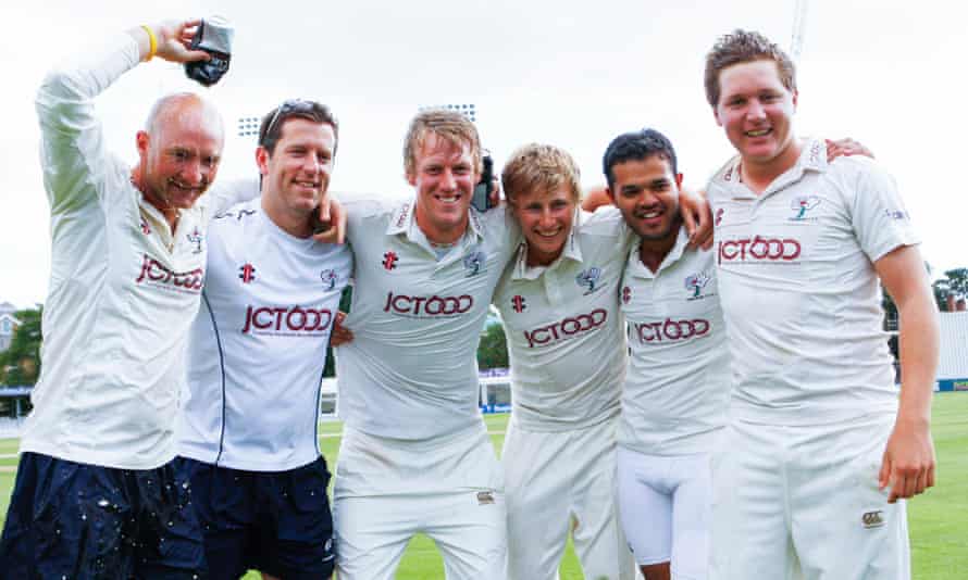 Joe Root and Azeem Rafiq celebrate Yorkshire’s promotion to Division One in September 2012.