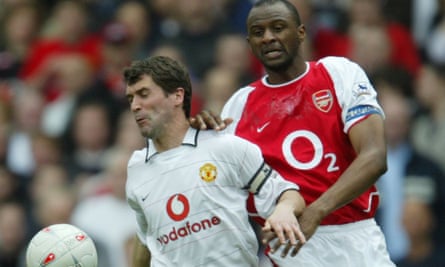 Patrick Vieira gets stuck in with Manchester United’s Roy Keane