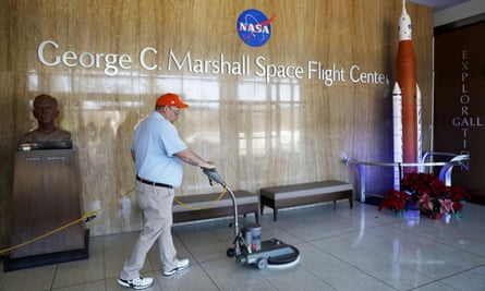 A worker cleans the floors at NASA’s Marshall Space Flight Center in Huntsville, Alabama, which has been impacted by the partial federal government shutdown.