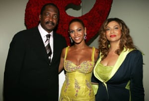 Beyonce poses with her father and manager Matthew Knowles and her mother Tina Knowles in 2005.
