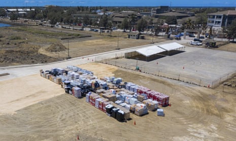 International aid supplies are stacked at the port at Nuku'alofa, in Tonga 