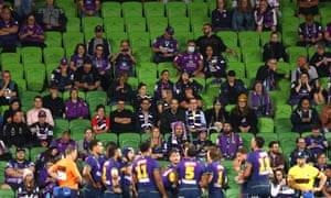 Spectators watch the round one NRL match between the Melbourne Storm and South Sydney Rabbitohs at AAMI Park. Photograph: Robert Cianflone/Getty Images