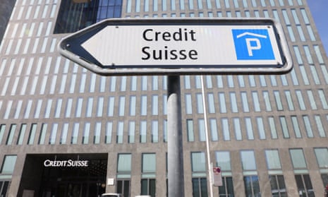 A view shows a signage of Swiss bank Credit Suisse in front of an office building in Zurich, Switzerland