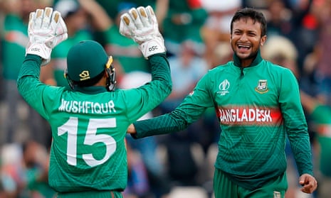 Bangladesh’s Shakib Al Hasan celebrates with teammate Mushfiqur Rahim after the dismissal of Afghanistan’s Najibullah Zadran