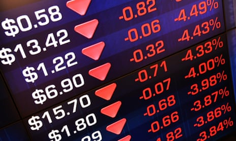 Market trading boards show losses at the Australian Securities Exchange in Sydney on Friday.