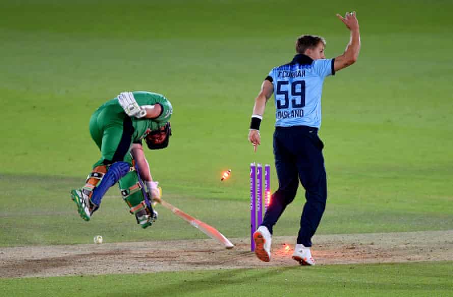 Ireland’s Paul Stirling (left) is run out by England’s Tom Curran.