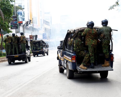 Police officers ride vehicles during a demonstration in Nairobi, Kenya June 25, 2025.