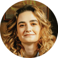 A woman smiles for a portrait
